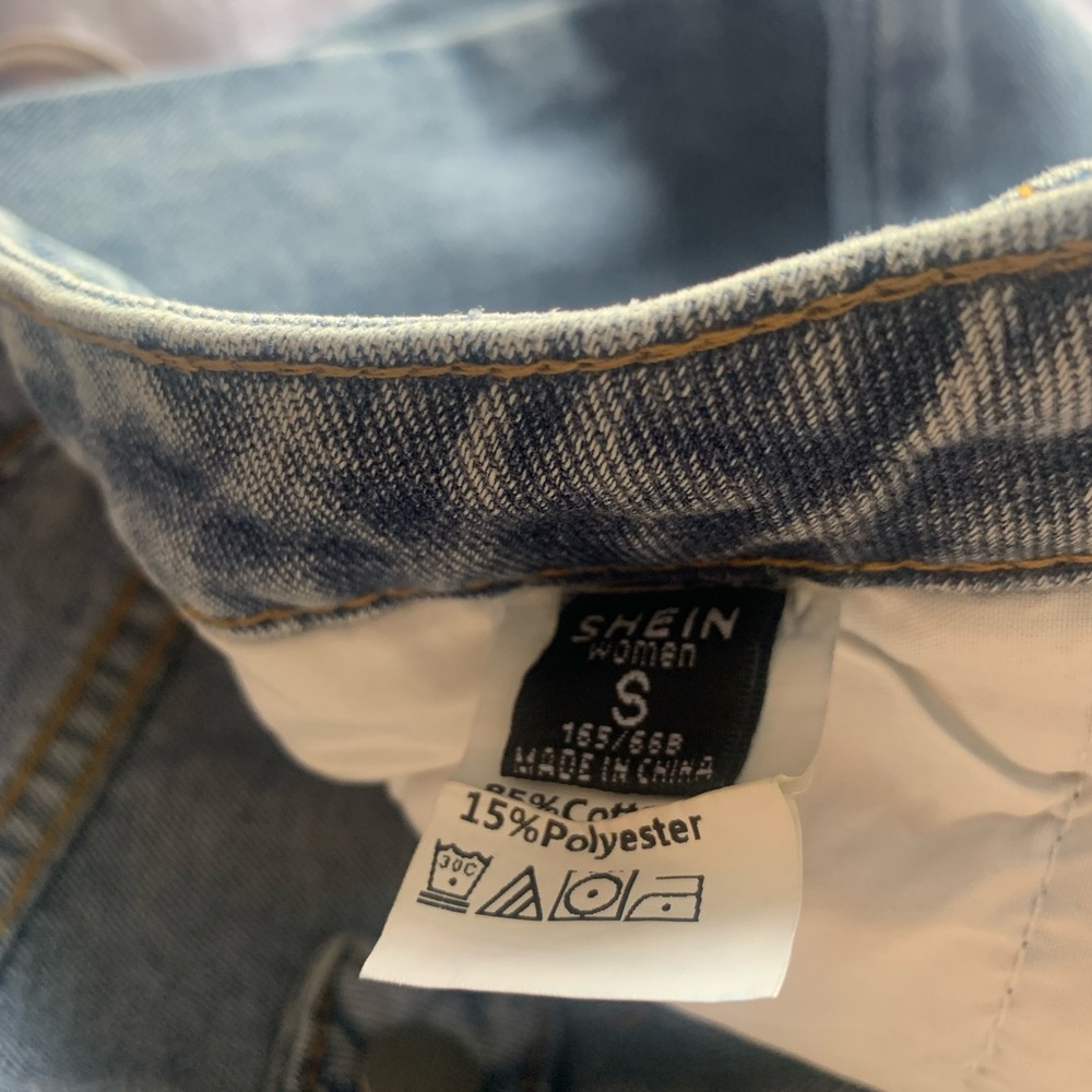 Jeans with a rip in the knee